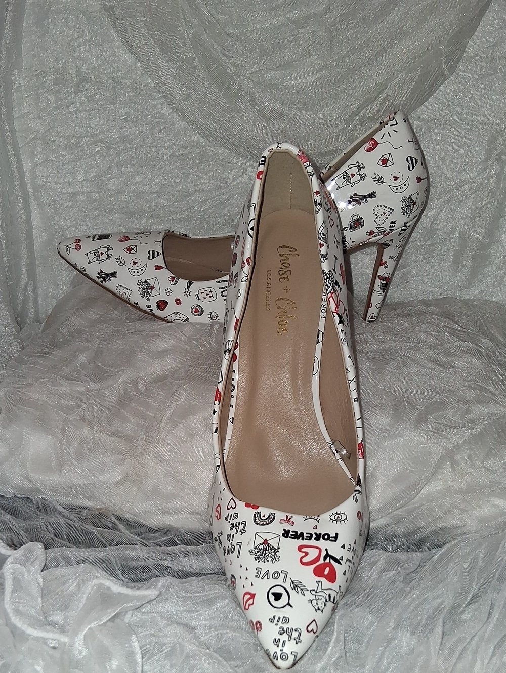 Chase + Chloe White Pointed-Toe Stiletto Heels with Black & Red Graphic Print
